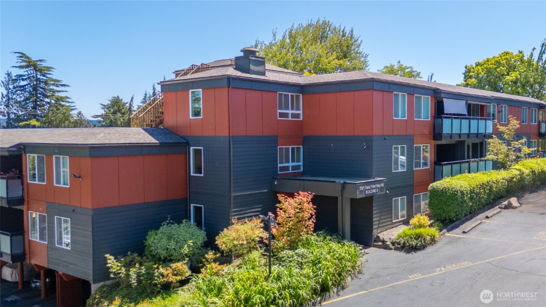 7021 Sand Point Way Northeast, Unit B201 Seattle, WA 98115 - Photo 2 of 29 a front view of a house