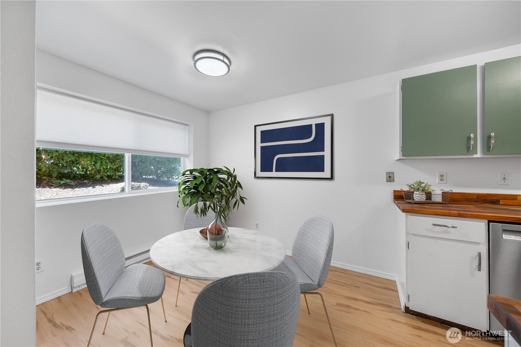 7021 Sand Point Way Northeast, Unit B201 Seattle, WA 98115 - Photo 9 of 29 a view of a dining room with furniture and window