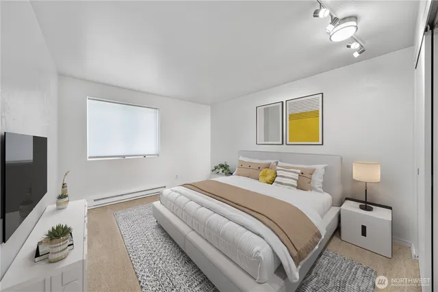 a bathroom with a sink toilet and a mirror