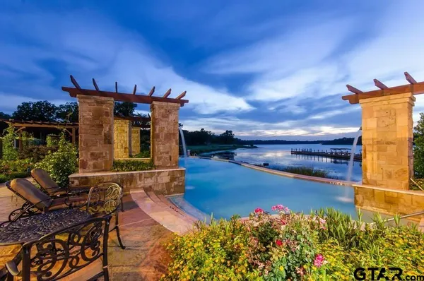 a view of a lake with outdoor space