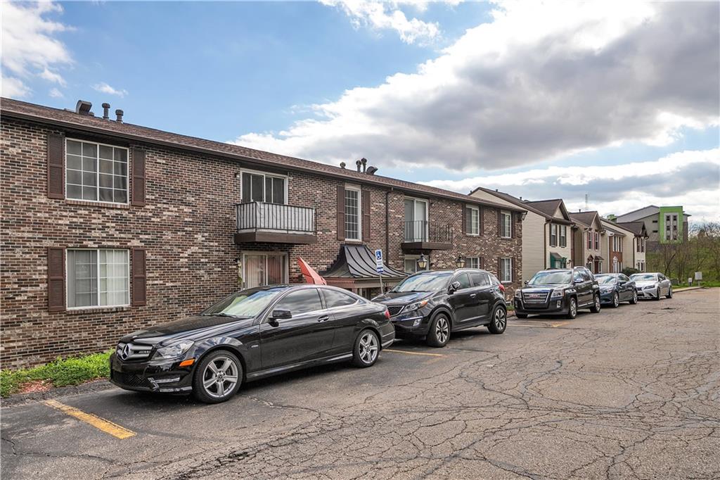 a car parked in front of a house
