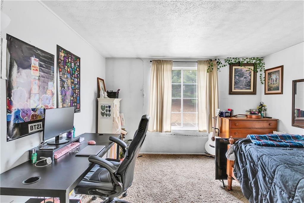 241 Coxcomb Hill Road, Unit 30 New Kensington, PA 15068 - Photo 13 of 16 a livingroom with workspace and a couch
