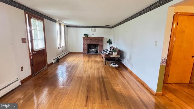 4202 Black Rock Road Hampstead, MD 21074 - Photo 15 of 30 a living room with furniture and a fireplace