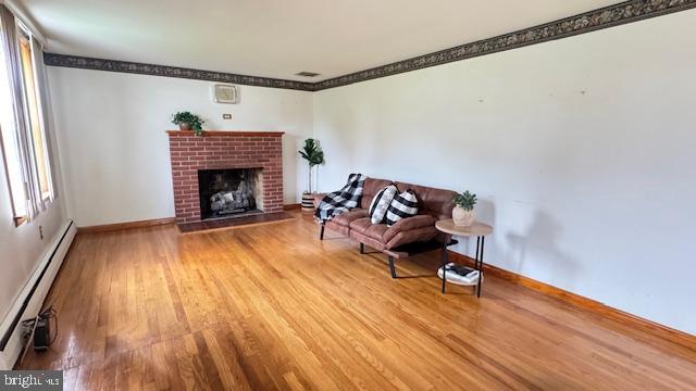 4202 Black Rock Road Hampstead, MD 21074 - Photo 16 of 30 a living room with furniture and a fireplace
