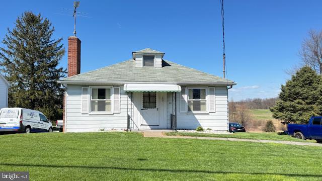 4202 Black Rock Road Hampstead, MD 21074 - Photo 26 of 30 a front view of a house with a garden