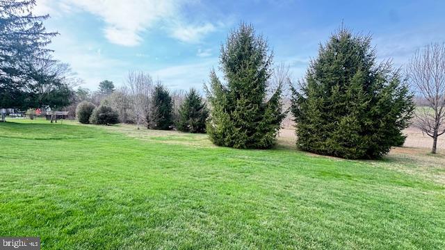 4202 Black Rock Road Hampstead, MD 21074 - Photo 3 of 30 a view of a field with trees in the background