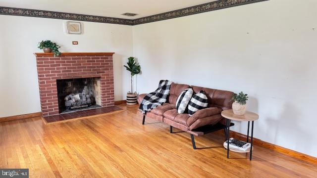 4202 Black Rock Road Hampstead, MD 21074 - Photo 6 of 30 a living room with furniture and a fireplace