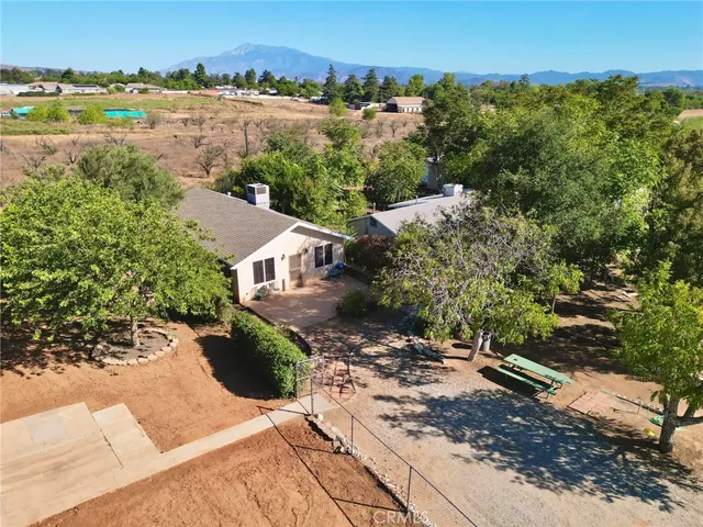 an aerial view of a house with garden
