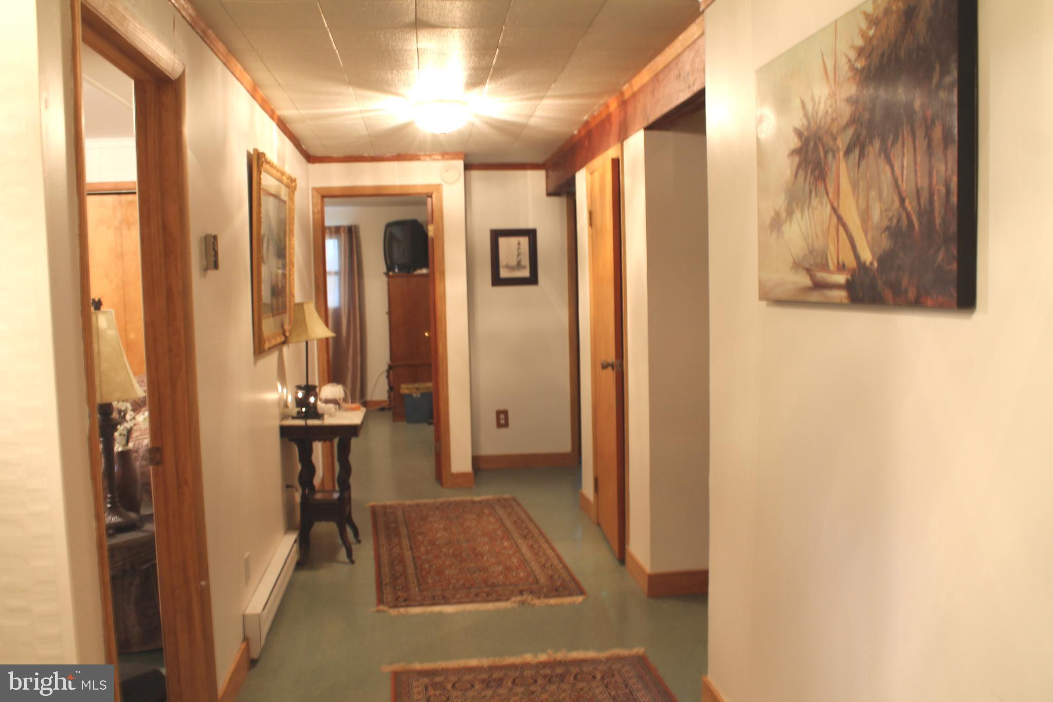 306 Liberty Road Reedville, VA 22539 - Photo 36 of 43 Downstairs hallway is extra wide
