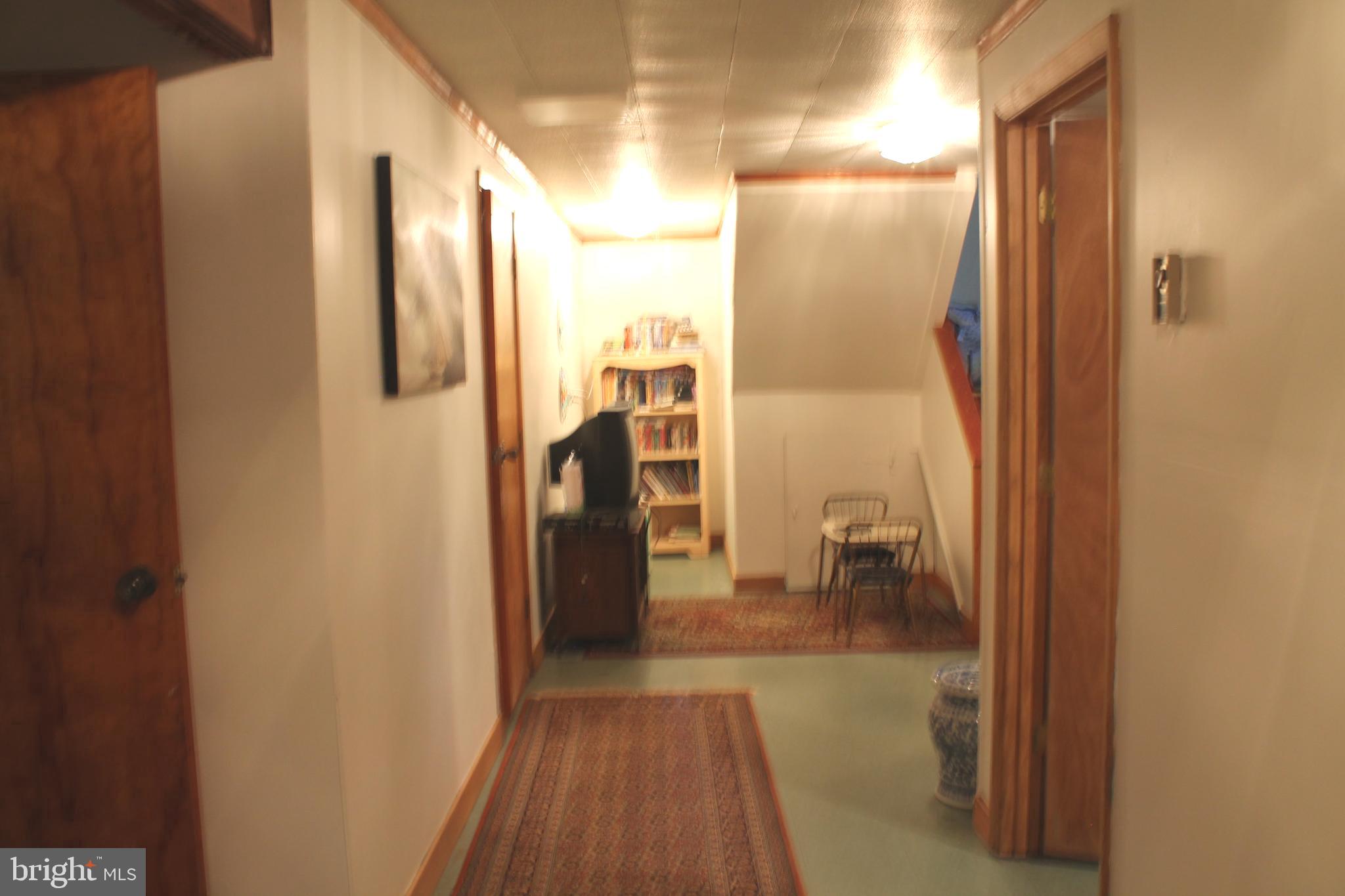 306 Liberty Road Reedville, VA 22539 - Photo 37 of 43 play area in downstairs hallway