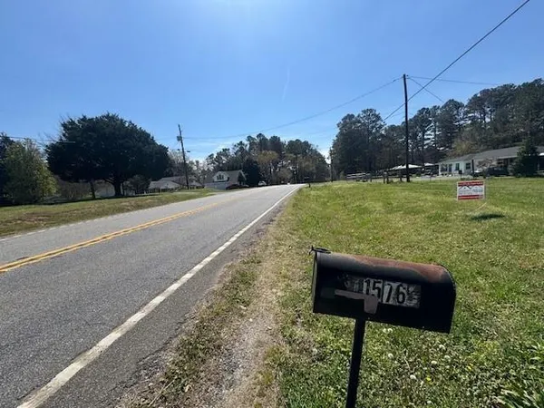 a view of a park with welcome board