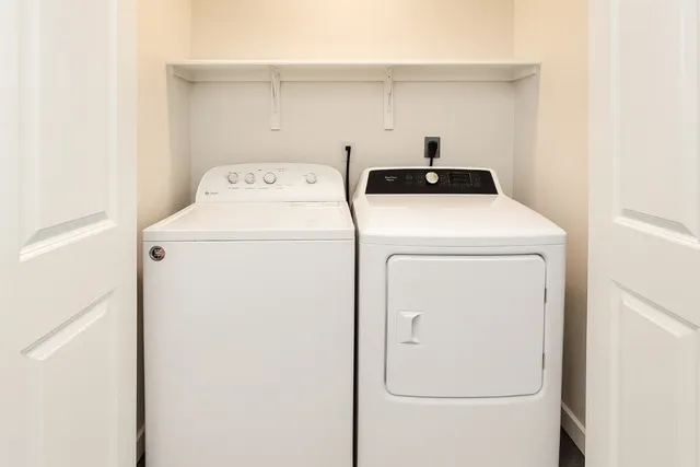 a utility room with dryer and washer