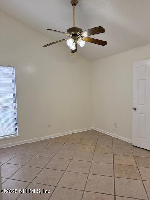 10703 Alden Road, Unit 1 Jacksonville, FL 32246 - Photo 14 of 18 a view of a room with a chandelier fan and glass door