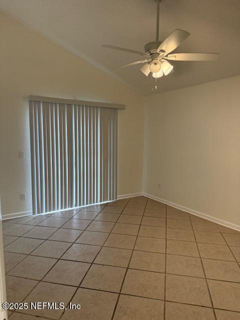 10703 Alden Road, Unit 1 Jacksonville, FL 32246 - Photo 8 of 18 a view of an empty room with a chandelier fan