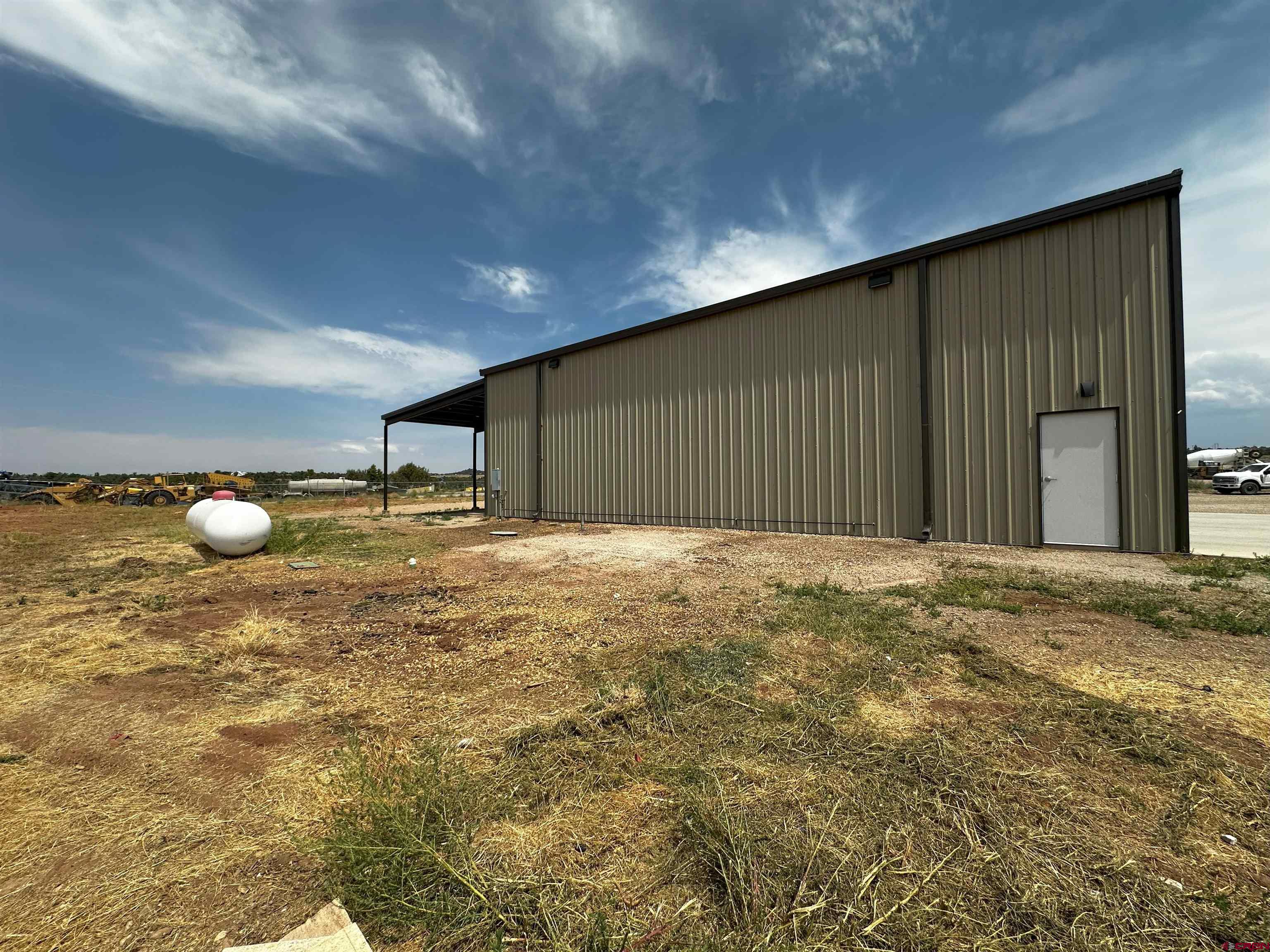27673 Rd T Dolores, CO 81323 - Photo 5 of 19 a view of a backyard of a house