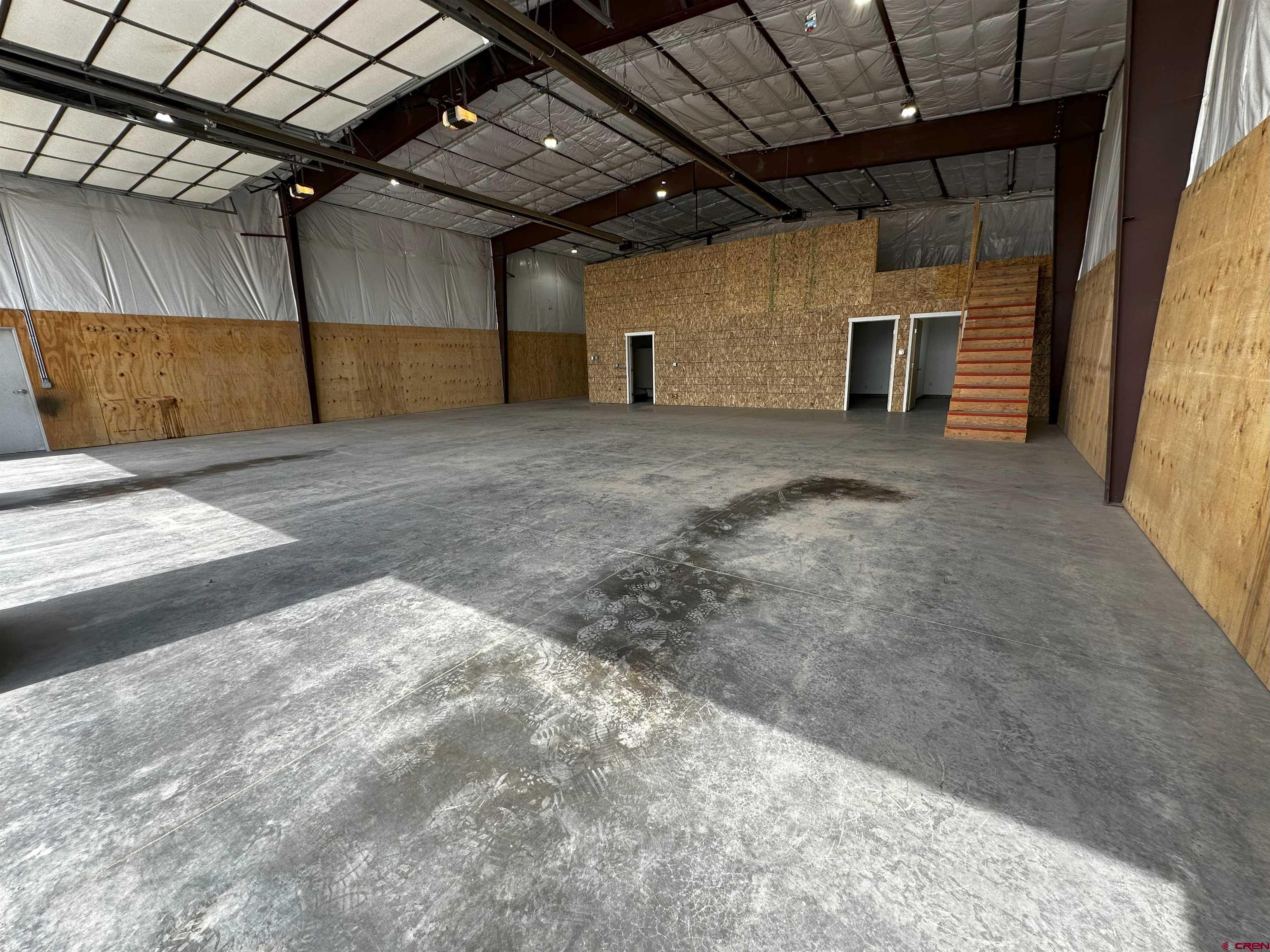 27673 Rd T Dolores, CO 81323 - Photo 7 of 19 a view of empty room with wooden ceiling
