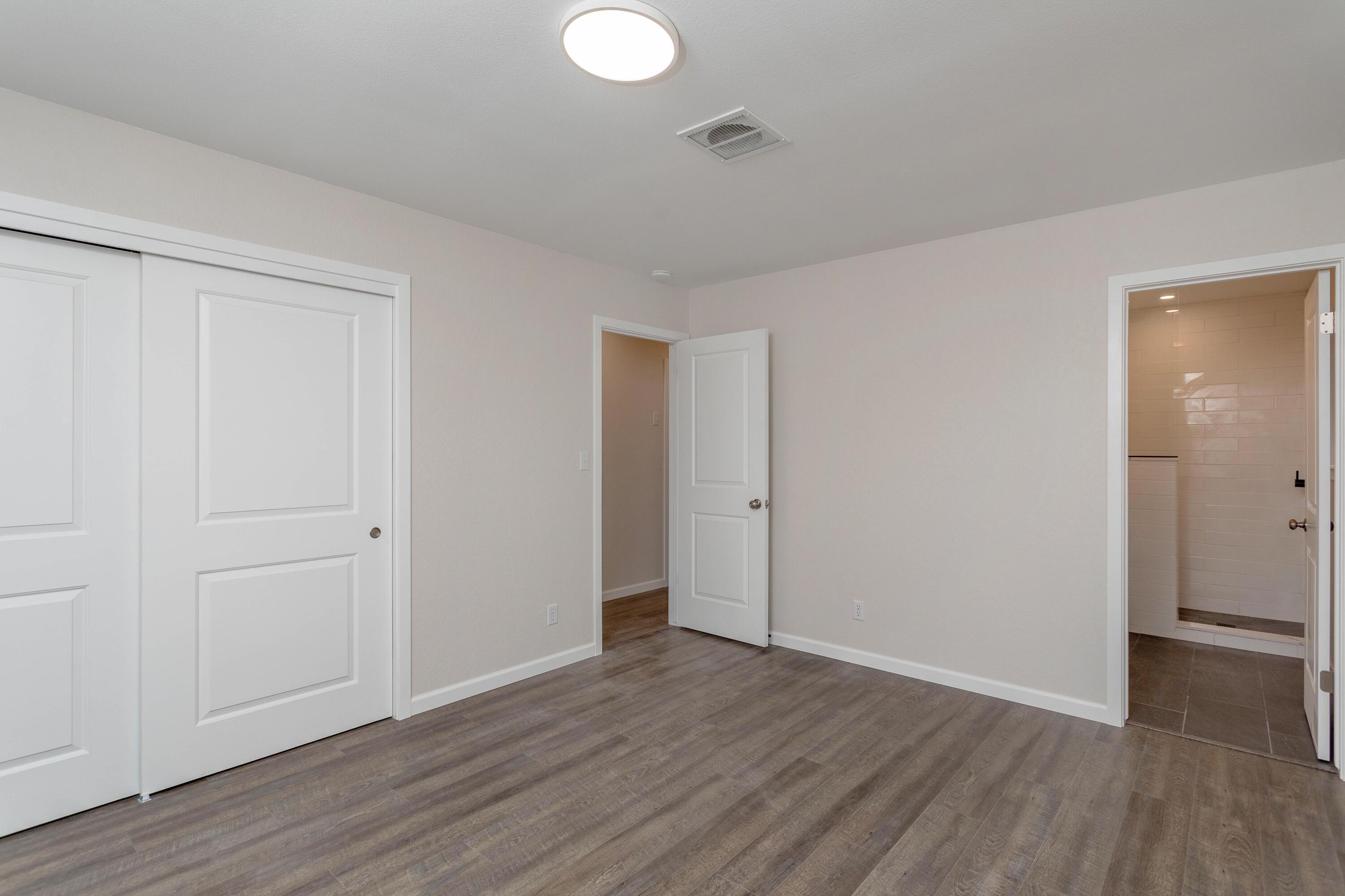 3693 Echo Road Redding, CA 96002 - Photo 13 of 30 a view of an empty room with wooden floor