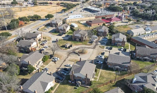 an aerial view of a city with ocean view