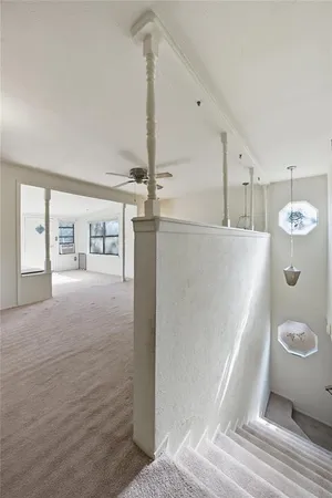 a very nice looking room with a ceiling fan
