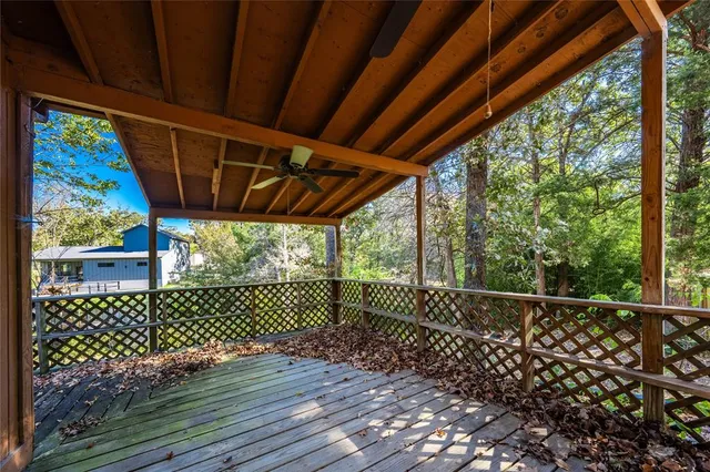 a view of outdoor space with wooden fence