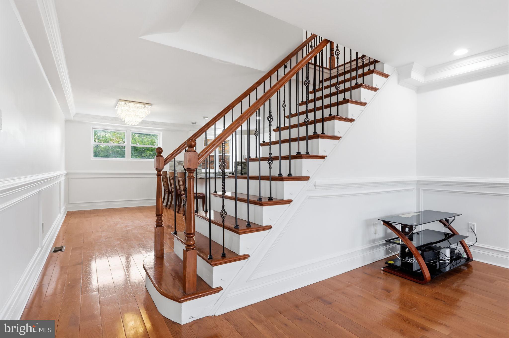 3811 Salina Road Philadelphia, PA 19154 - Photo 8 of 48 Elegant staircase in bright foyer.