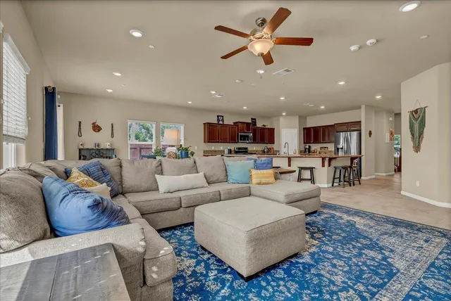 a bedroom with a bed and dresser