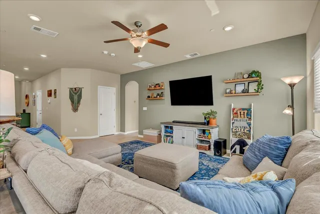 a large bathroom with a glass door shower a sink and a mirror
