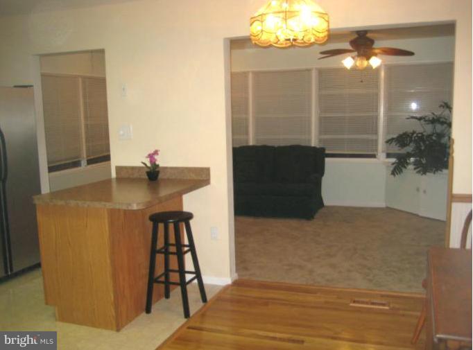 1602 Wise Road Point of Rocks, MD 21777 - Photo 9 of 24 view through kitchen/dining to family rm/sun rm