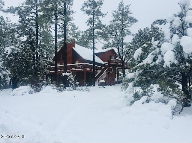 5579 Solitude Trail Loop Pine, AZ 85544 - Photo 44 of 50 a view of a covered with snow in the yard