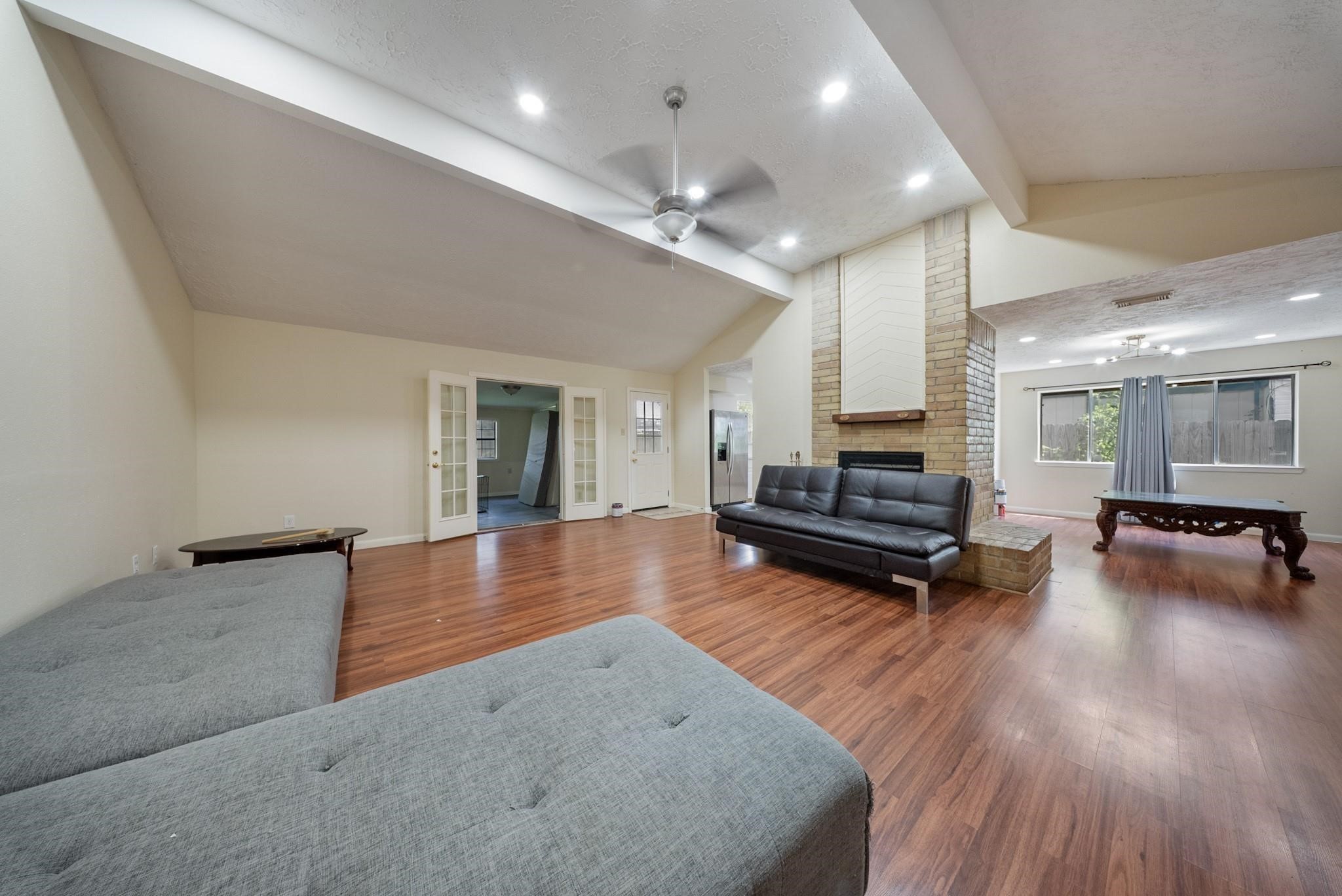 15738 Tammany Lane Houston, TX 77082 - Photo 17 of 22 a lobby with furniture and wooden floor