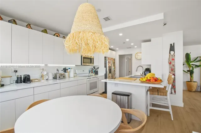 a outdoor living space with furniture and a book shelf