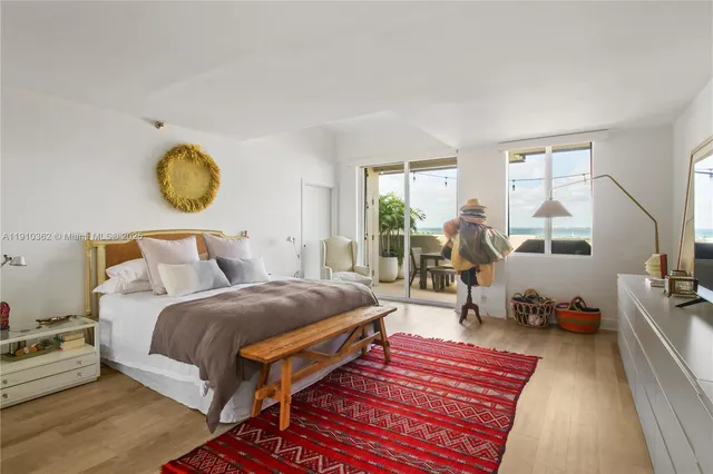 a very nice looking room with a dining table chairs