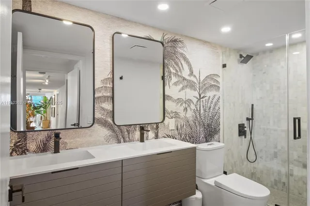 a bedroom with a bed and a potted plant