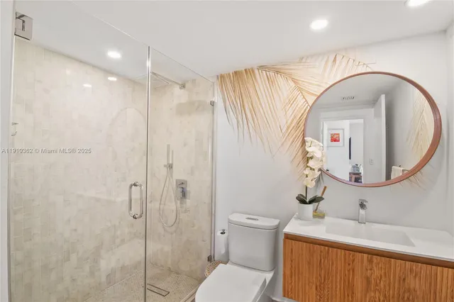 a bedroom with two beds and painted walls