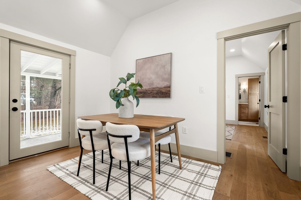 118 Hanover Street Hanover, MA 02339 - Photo 14 of 41 a view of a dining room with furniture and wooden floor