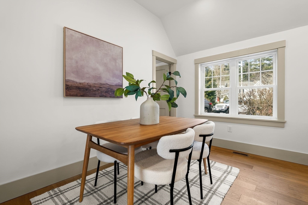 118 Hanover Street Hanover, MA 02339 - Photo 15 of 41 a view of a dining room with furniture window and wooden floor