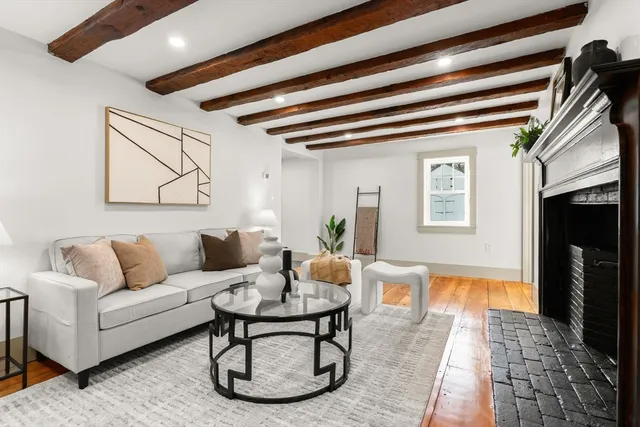 a living room with furniture and a table