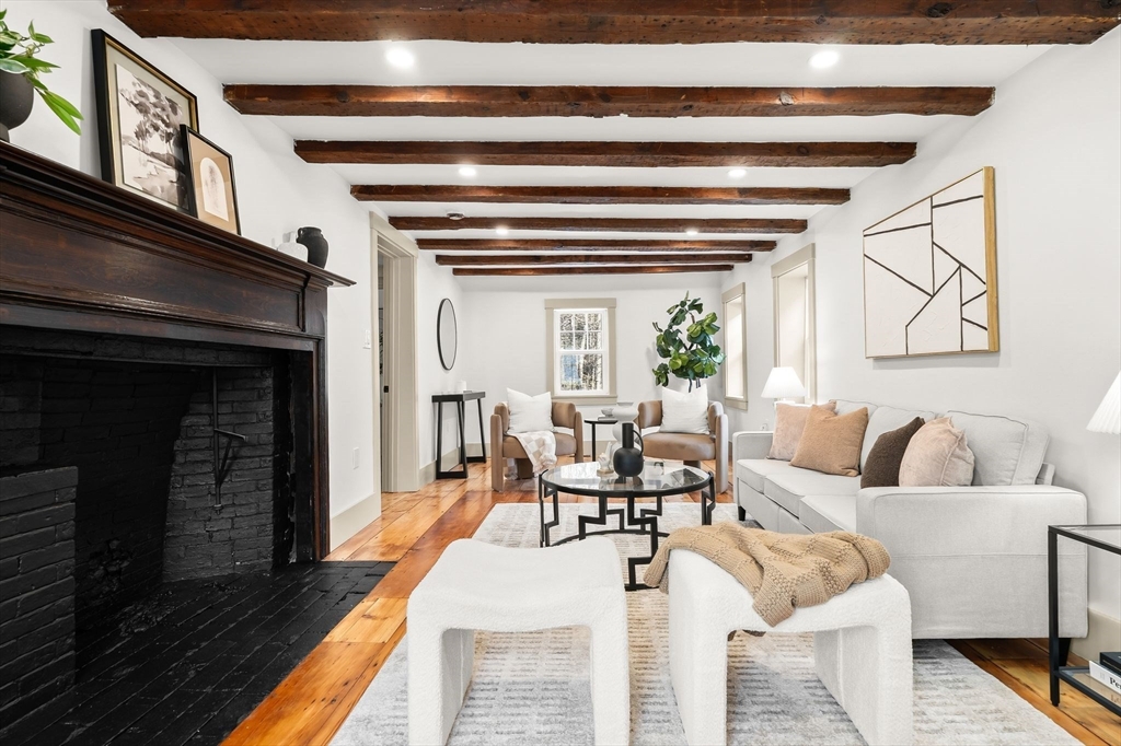 118 Hanover Street Hanover, MA 02339 - Photo 20 of 41 a living room with furniture and a fireplace