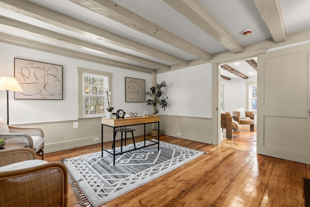 118 Hanover Street Hanover, MA 02339 - Photo 22 of 41 a living room with furniture and a table