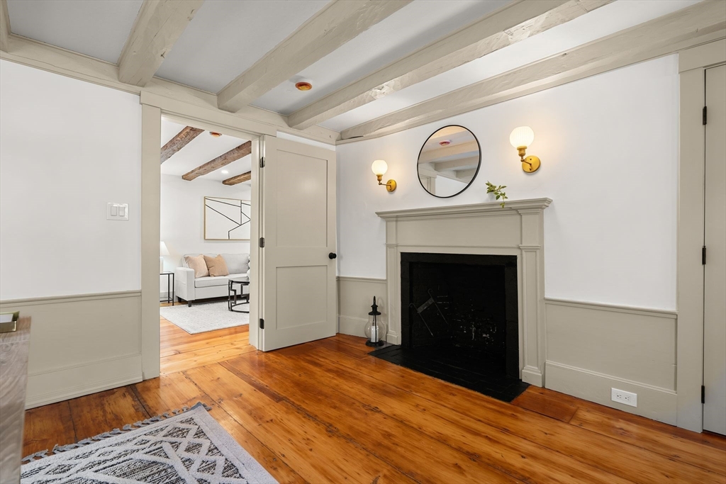 118 Hanover Street Hanover, MA 02339 - Photo 24 of 41 a living room with furniture and a fireplace
