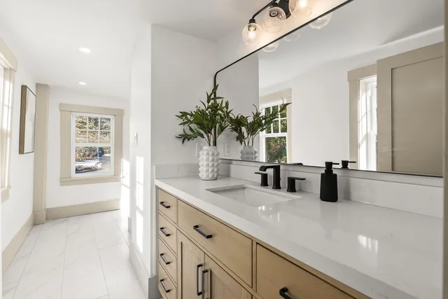 a kitchen with sink and window