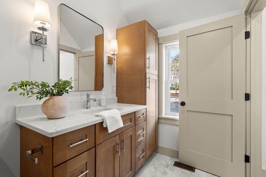 118 Hanover Street Hanover, MA 02339 - Photo 31 of 41 a bathroom with a sink and a mirror