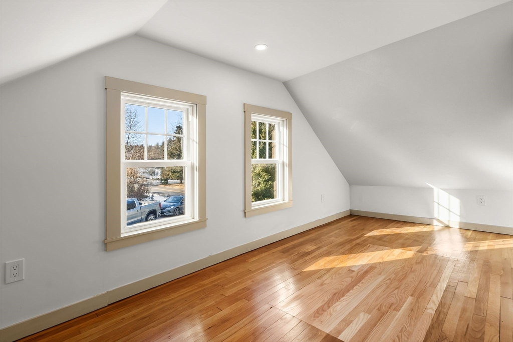 118 Hanover Street Hanover, MA 02339 - Photo 33 of 41 a view of an empty room with wooden floor and a window