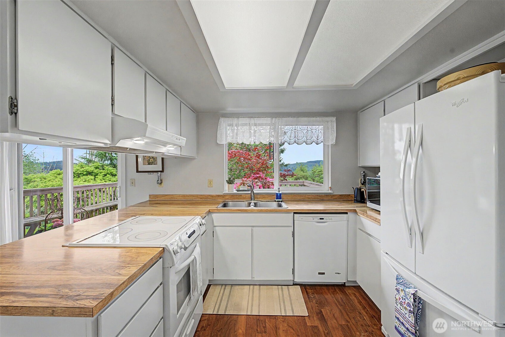 1611 Ham Hill Road Centralia, WA 98531 - Photo 12 of 40 a kitchen with a sink stove and refrigerator