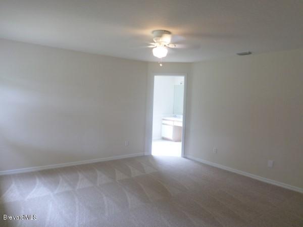 1758 Palm Ridge Road Melbourne, FL 32935 - Photo 8 of 13 Master Bedroom
