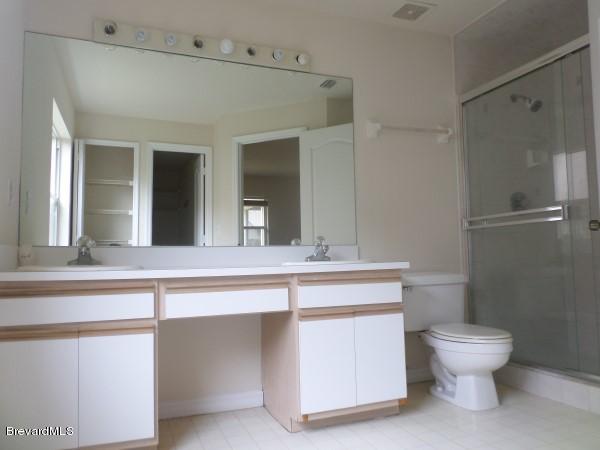 1758 Palm Ridge Road Melbourne, FL 32935 - Photo 9 of 13 Master Bathroom