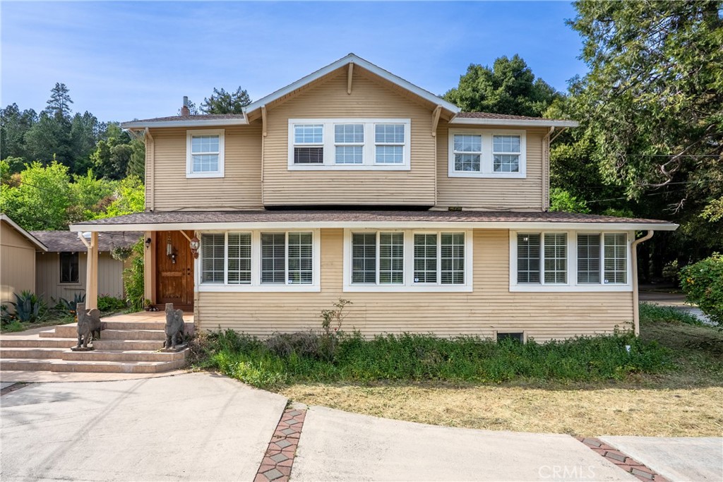 6701 East Zayante Road Felton, CA 95018 - Photo 2 of 44 front view of house with a yard