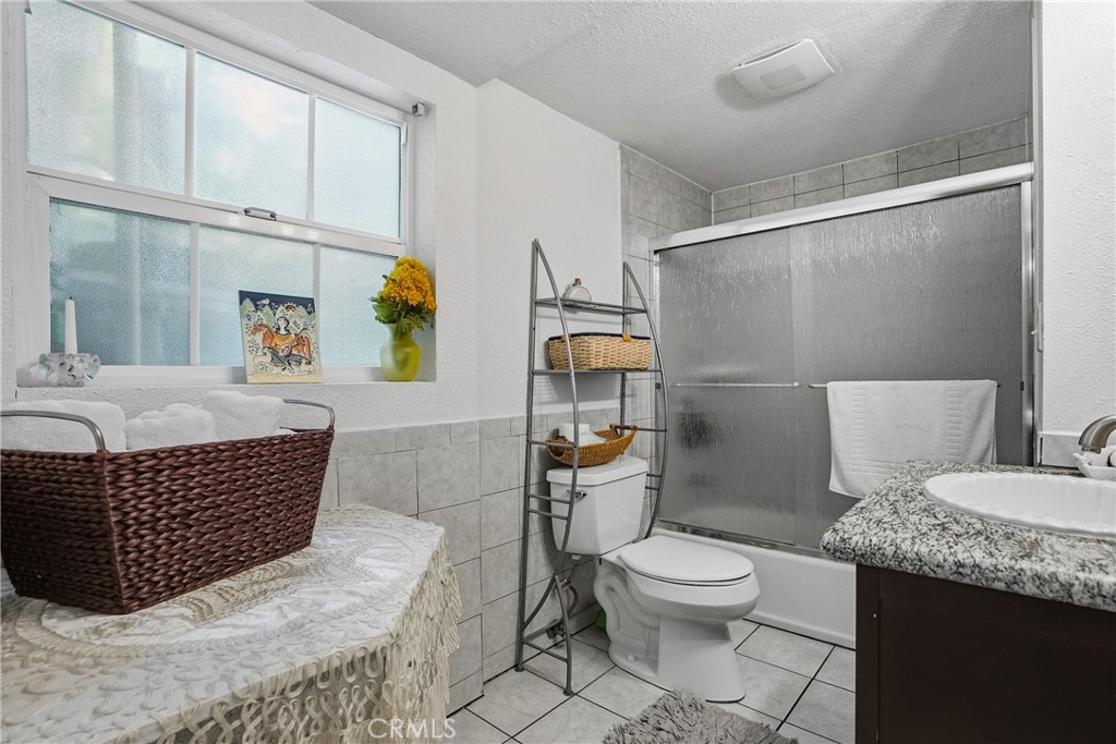 6701 East Zayante Road Felton, CA 95018 - Photo 24 of 44 a living room with furniture and wooden floor