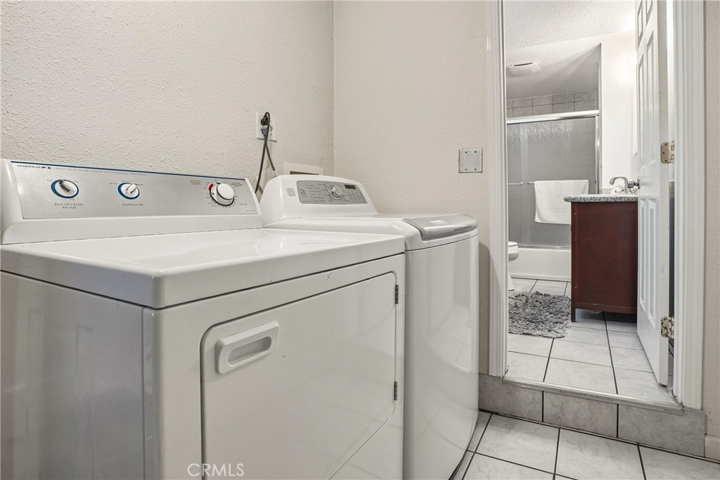 6701 East Zayante Road Felton, CA 95018 - Photo 25 of 44 a utility room with dryer and washer