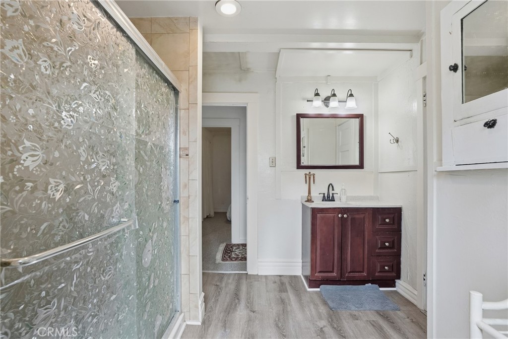 6701 East Zayante Road Felton, CA 95018 - Photo 33 of 44 a bathroom with a sink a mirror and a shower